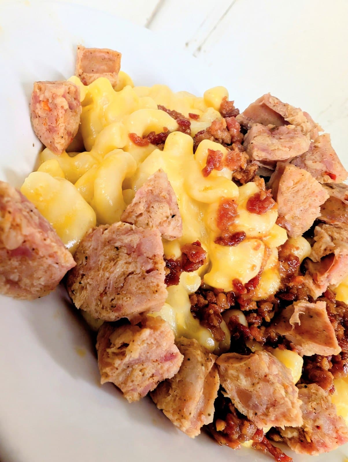 Mac and cheese with sausage and bacon at Rosey Baby